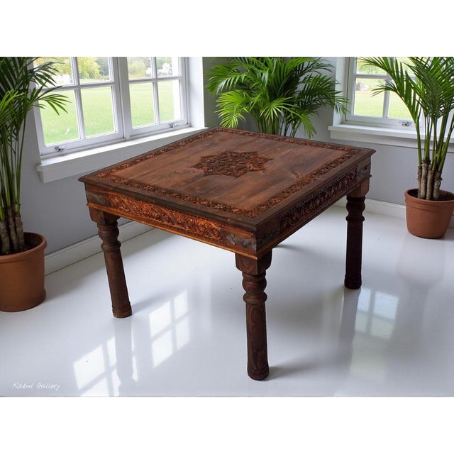 A very beautiful, rare, and solidly crafted oriental table from Afghanistan. Solid wood, handmade and hand-carved. This...