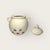 Practically magical, a vintage ceramic garlic keeper from Cook's Club, a novelty kitchenware brand active in the 1970s....
