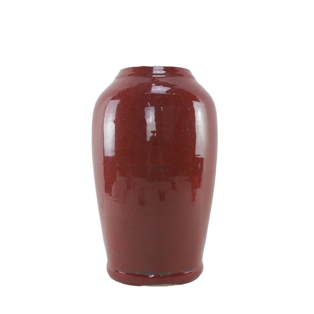 Mid-19th century red glaze ground-mouth vase. The mouth of this vase may be bruised, and later it was polished with a...