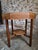 A Dutch oak side table dating from around 1925–1935, designed in the Amsterdam School style. The table is made of solid...