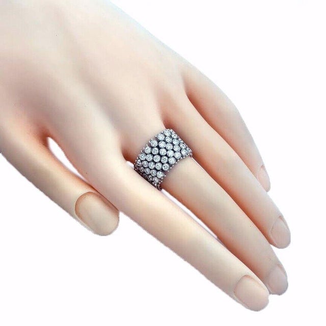 This gorgeous authentic Birks ring is crafted from 18k white gold featuring a soft flexible chain band 14mm wide 23mm...