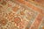 An early 20th-century room size Antique Turkish Oushak rug in predominantly ivory and orange with teal and brown...