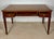 Elegant early 20th century writing desk crafted in hardwood and inspired by the refined lines of the Louis XVI period. The...