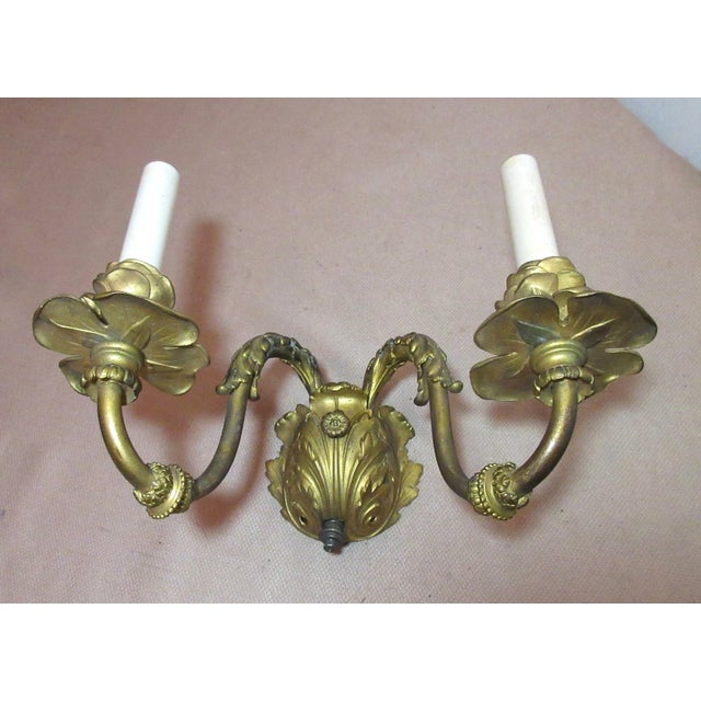 Up for sale is a very high quality antique dore bronze electric wall sconce. It's done with very ornate detailing and is a...