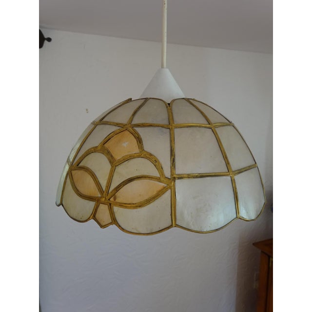 1970s model, white and pale pink, fleur-de-lis pattern. Mosaic with gold inserts. White PVC canopy, conical shape....