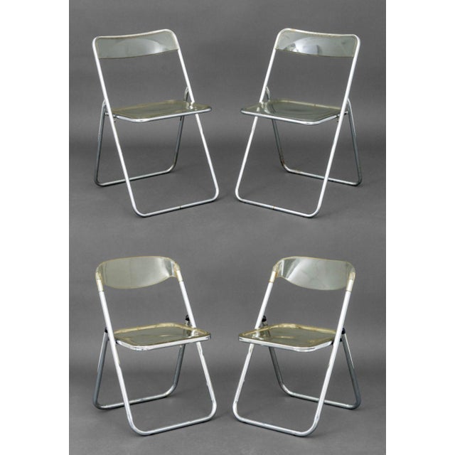 Group of Four Giancarlo Piretti for Castelli "Plia" Style Folding Lucite Chairs, two with Lucite top rails and all with...