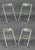Group of Four Giancarlo Piretti for Castelli "Plia" Style Folding Lucite Chairs, two with Lucite top rails and all with...