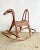 An absolutely fabulous sculptural mid century modern Italian wicker and rattan rocking horse by designer, Franco Albini....