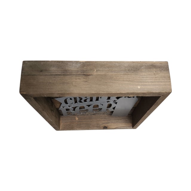 Wooden shadow box featuring a metal 'Craft Beer' cutout design. • Sturdy wooden construction • Decorative metal cutout...