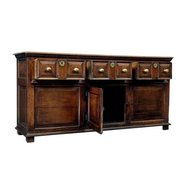 English 18th century oak dresser circa 1720. We are pleased to offer this functional 300 year old piece of furniture...