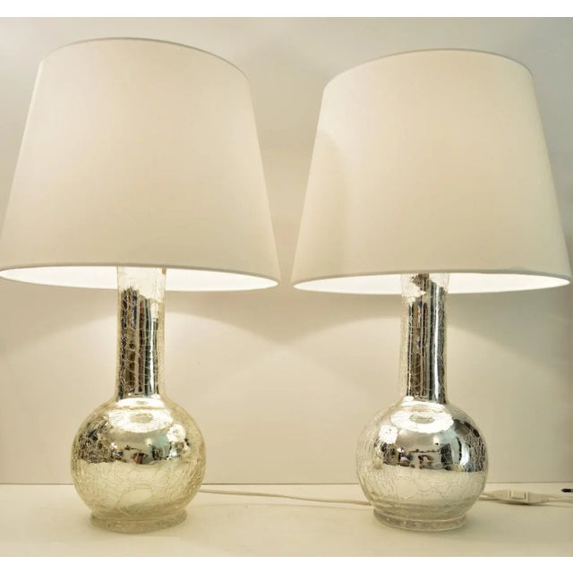 A very nice pair of crackled silver glass table lamps designed by Uno & Östen Kriastiansson for Luxus in the 1960´s. One...