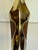 Here is a sculptural circa 1960 table lamp attributed to Laurel Lamp Company, featuring a dramatically tapered brass-...