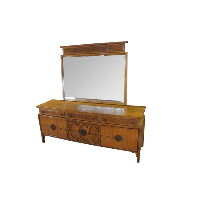 A nine-drawer dresser with a matching landscape mirror, designed in an Asian-inspired or "Chinoiserie" mid-century modern...