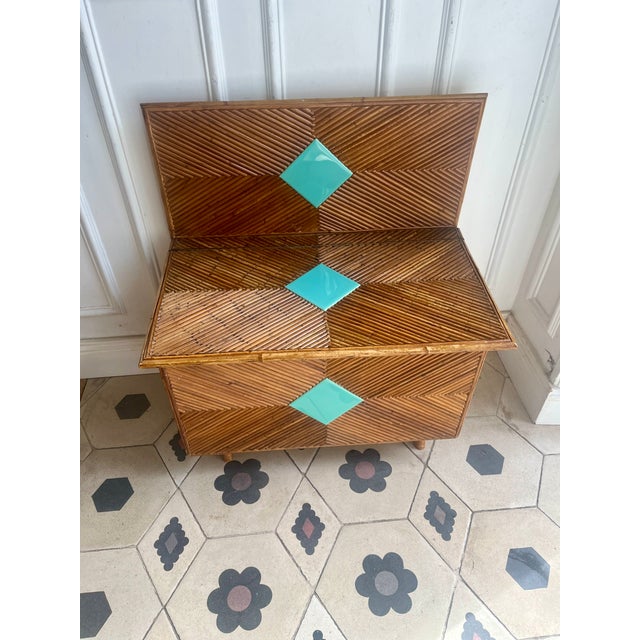 This wooden chest bench with rattan marquetry is a unique, handcrafted piece. It can be used in an entryway or a child's...