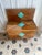 This wooden chest bench with rattan marquetry is a unique, handcrafted piece. It can be used in an entryway or a child's...