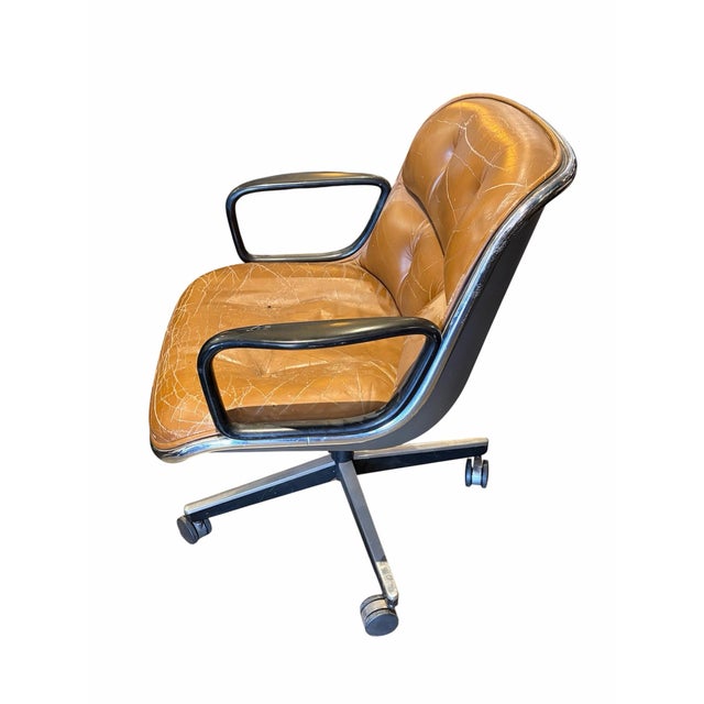 Mid-century executive Pollock desk chair designed by Charles Pollock for Knoll International. Featuring tan or cognac...