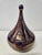 A vintage lidded teardrop-shaped porcelain bowl or box in the style of pieces by Rosenthal. This piece is purple and gold...