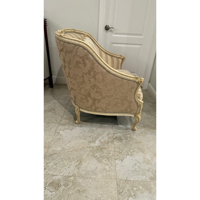 This exquisite French Country-inspired Bergère armchair showcases Henredon’s signature craftsmanship. Constructed from...