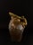 Ceramic jug with metallic luster glaze by Delphin Massier (1836-1907) from the late 19th century. The body of the jug...