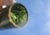 Fine home decor, a deep green nephrite vase with a thin modern edge in lacquered brass. Soft swelling walls that narrow to...