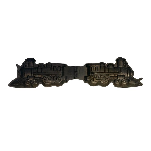 Wonderful Art Deco antique chocolate mold in the shape of a train. Sure gift idea for display or a chocolate maker who...