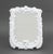Serge Roche Style White Painted Composite Wall Mirror, with scrolling foliate motifs, unmarked. Overall: 15" H x 11" W x...