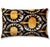 "This luxury silk velvet ikat lumbar pillow features a striking black ground accented with rich gold and soft ivory tones,...