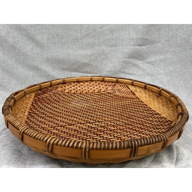 Lovely vintage shallow winnowing basket. Very good condition. Basket measures 16" in diameter by 2 3/4".