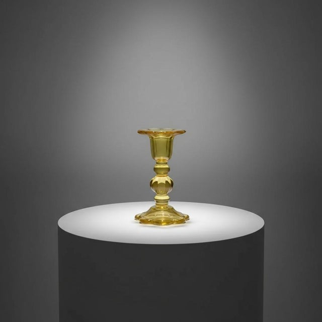 Bring a touch of Italian craftsmanship to your home with this vintage yellow art glass candlestick made in Italy by Franco...