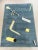 This rectangular rug, designed by Fritsch Design, features abstract geometric patterns in the Bauhaus/Postmodern style of...