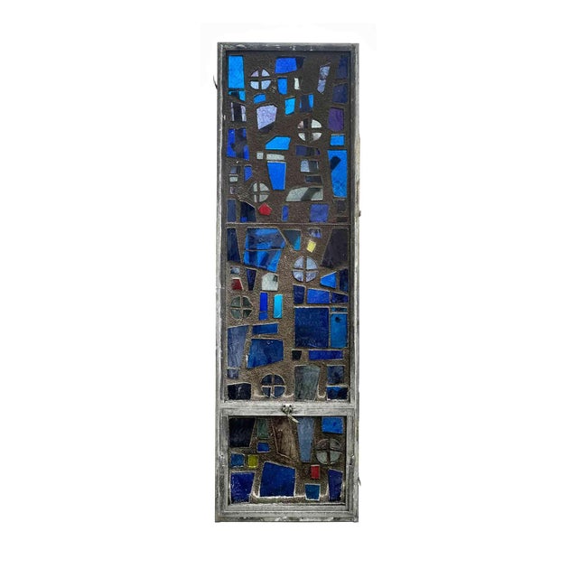 Pair of vintage mid-century modern abstract colored stained glass windows. Glass is in cast stone. Set in aluminum frames....