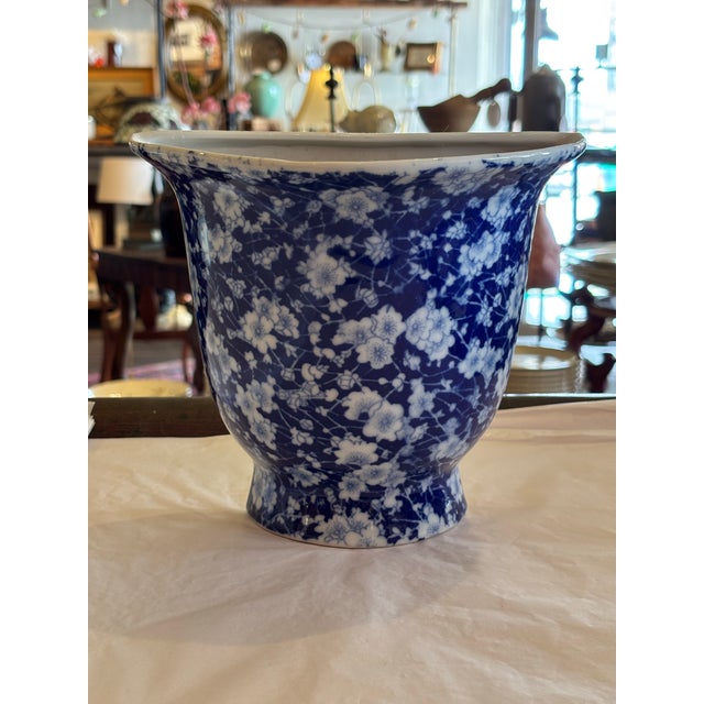 Lovely blue and white floral glazed ceramic wall pocket.