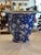 Lovely blue and white floral glazed ceramic wall pocket.