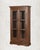 There is a particular quality to old teak, the way it deepens with age, darkening to warm amber, holding light rather than...
