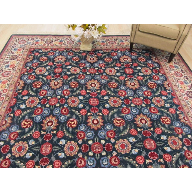 Hand-knotted in wool, this 9 x 12 Jasmine Opulent rug carpet is a refined addition to our contemporary room-size rug...