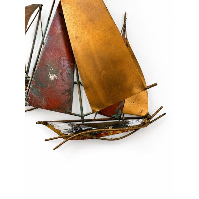 A striking vintage signed C. Jeré for Artisan House Mid-Century Modern wall sculpture depicting a dynamic group of...