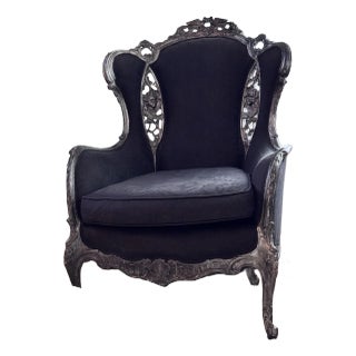 Early 20th Century Vintage Hand Carved Wing Chair For Sale
