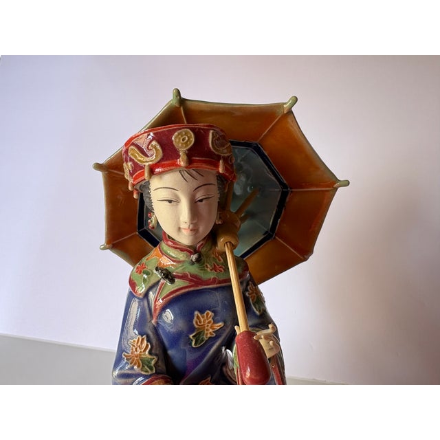 The vintage "Ancient Palace Princess," painted in the traitional style of the "Wucai"-(five color). Made in Shiwan, China...