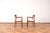 This set of two armchairs was designed in the 1960s by Henning Kjærnulf for Korup Stolefabrik (K.S. Mobelfabrik). The...