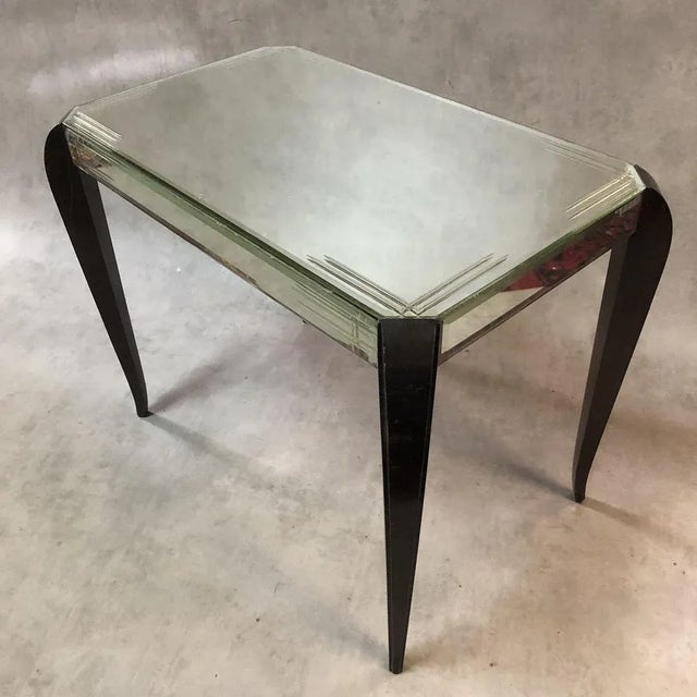 Coffee table glass beveled and etched rectangular years 40's manufactured by the company Mobiglace. This piece has an...