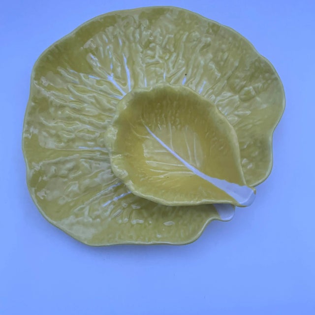 Possibly made by Secla. Yellow majolica cabbage ware. Included are two pieces which make up the chip and dip set. Both...