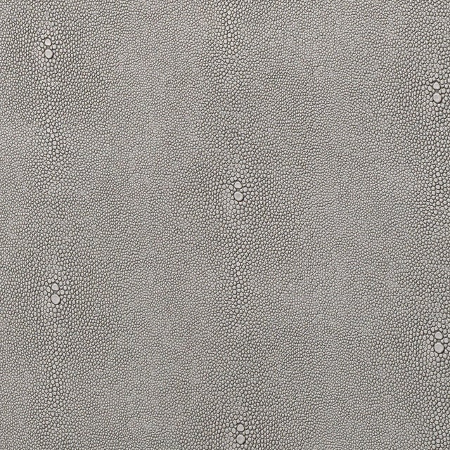 Shagreen is traditionally made from the richly textured skin of stingrays. It was popularized in Japan where it was used...