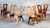 Set of 8 architectural vernacular dining chairs from the 1970s European studio craft movement, styled in the manner of...