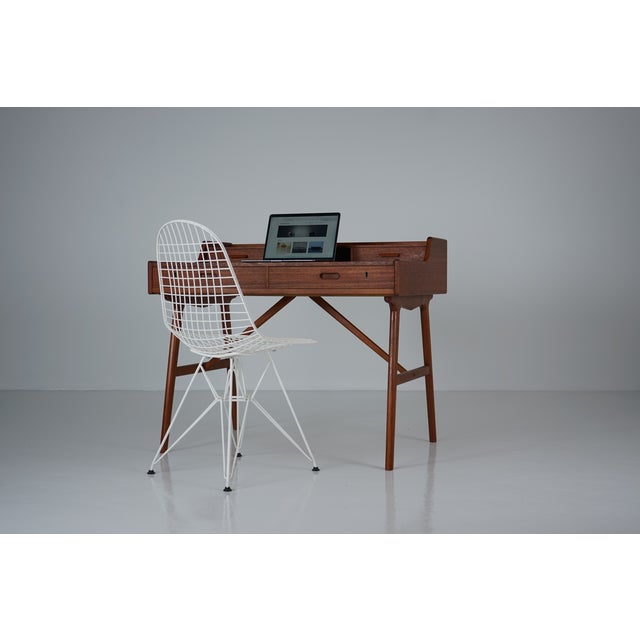 Selected items – We change the way you think about forever. Danish desk, Model 64, designed by Arne Wahl Iversen...