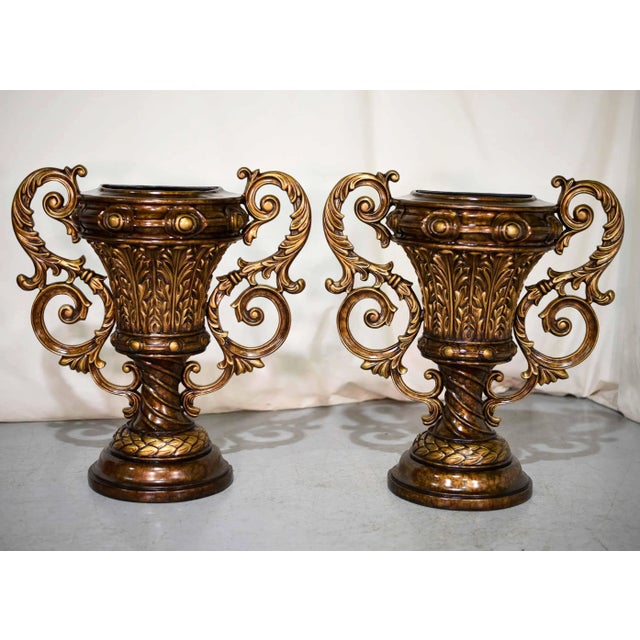 Upgrade your exterior or interior with this pair of fabulous classic urn-shaped cast fiberglass planters. Designed to be...