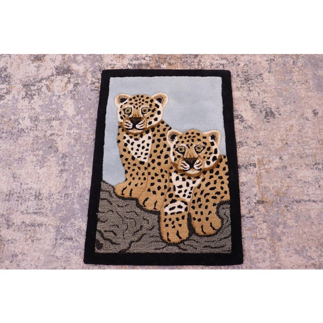 Indulge yourself in the unique beauty and timeless style of this exotic animal print rug. Define any space and add an...