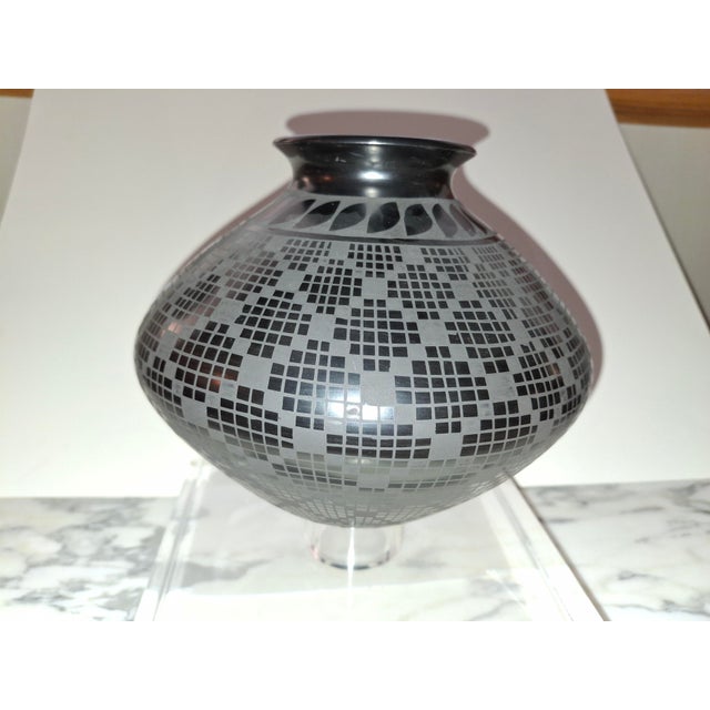 This Mata Ortiz Blackware seed pot was hand made in Mata Ortiz, a village in Chihuahua, Mexico, known for producing...