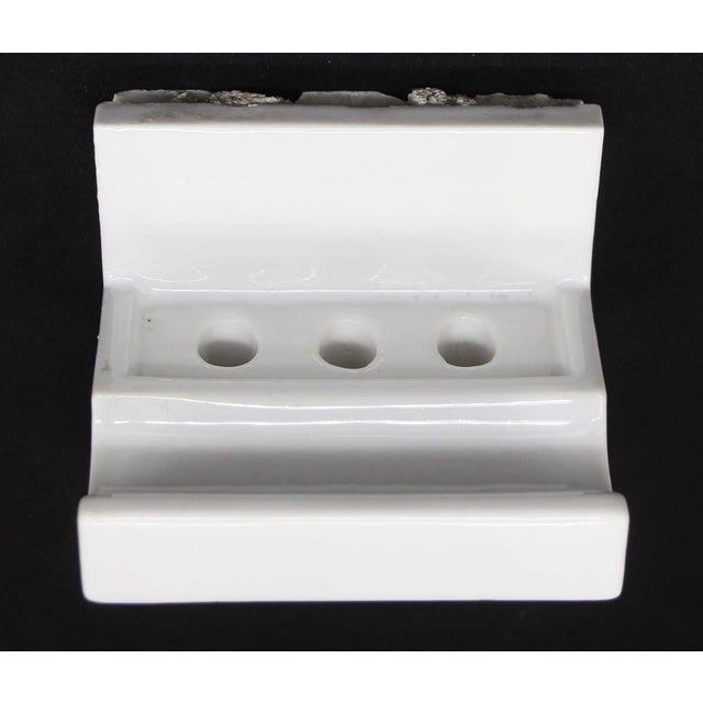 Vintage reclaimed recessed wall mount toothbrush holder made of ceramic with a white porcelain finish. It is compatible...