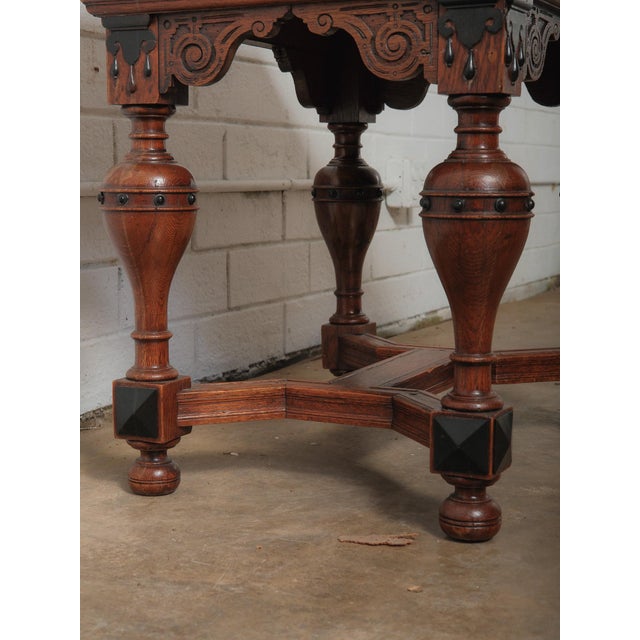 Wood Antique Renaissance Revival Extendable Oak Table With Carved Masks and Ornate Detailing For Sale - Image 7 of 9