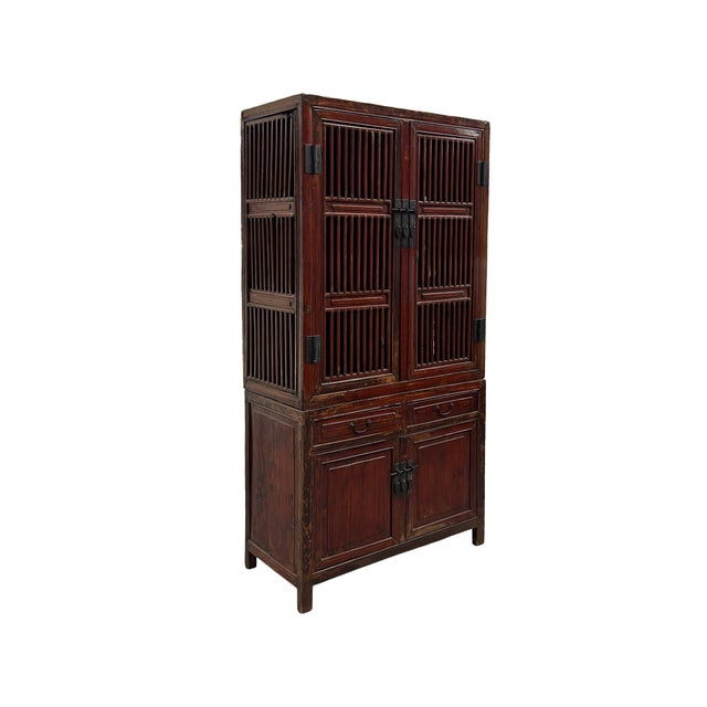 This vintage Oriental storage bookcase exudes a rustic, time-worn elegance, finished in a deep reddish-brown lacquer that...